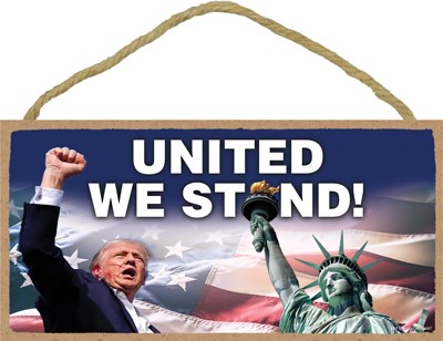Trump - United We Stand - Trump w/fist in air next to the Statue of Liberty..